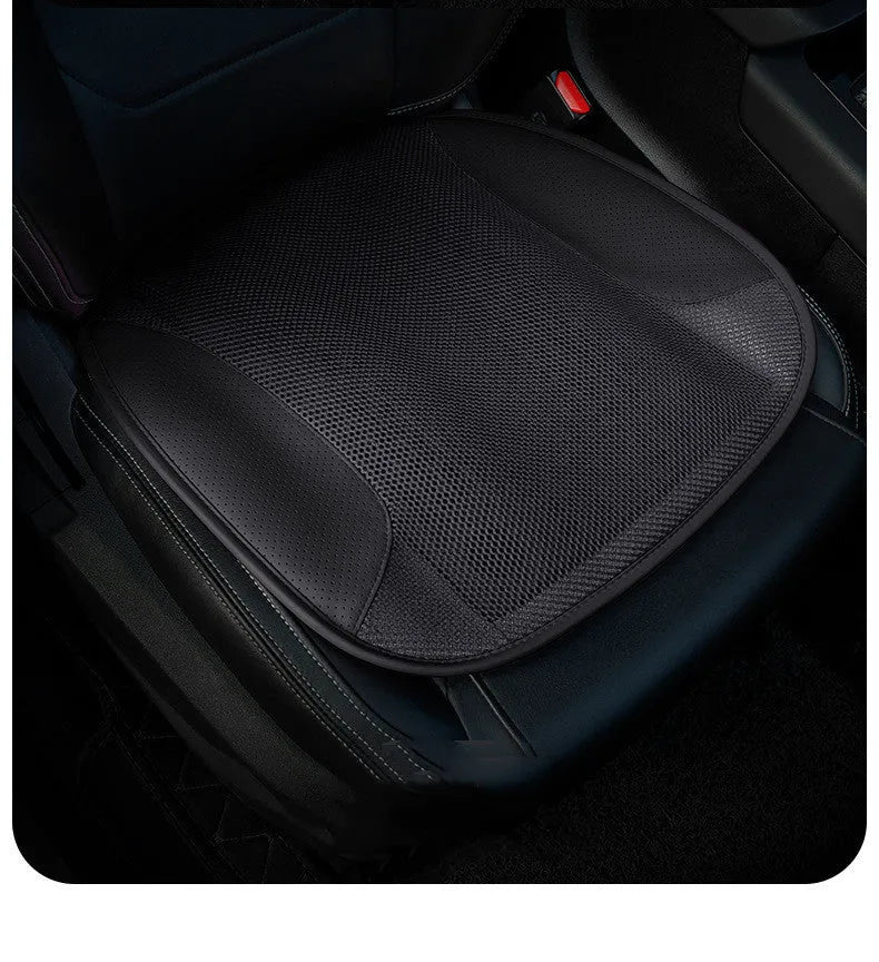 Black USB ventilated car seat cushion with cooling fans on a car seat.