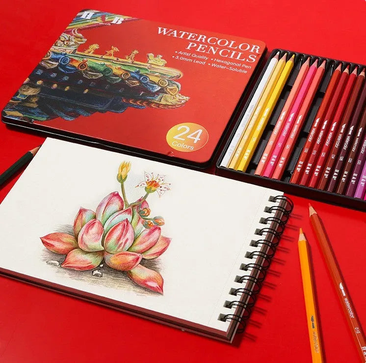 Open iron box showing 24 water-soluble coloured pencils and a brush for art projects