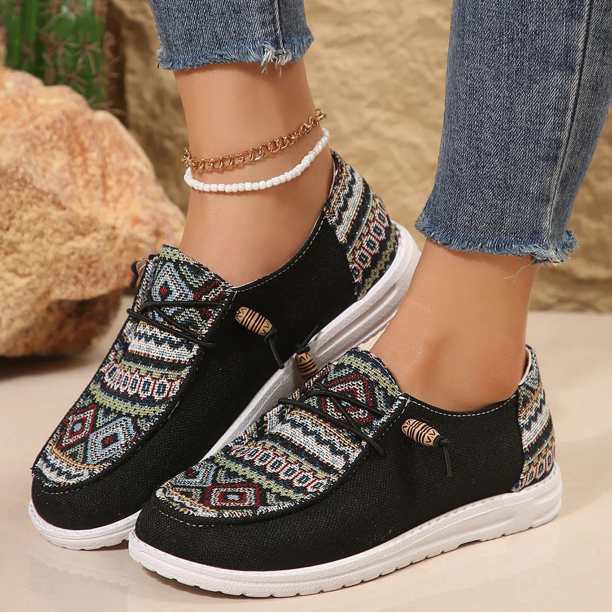 Women's flat round toe casual shoes in black, dark grey, or khaki with a low-top design and rubber sole.