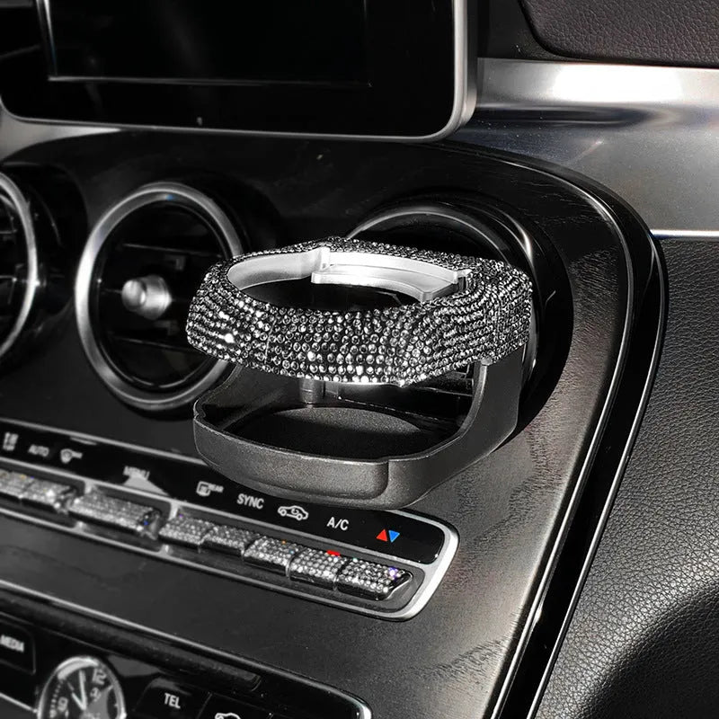 White rhinestone-decorated car cup holder bracket mounted on a car air vent