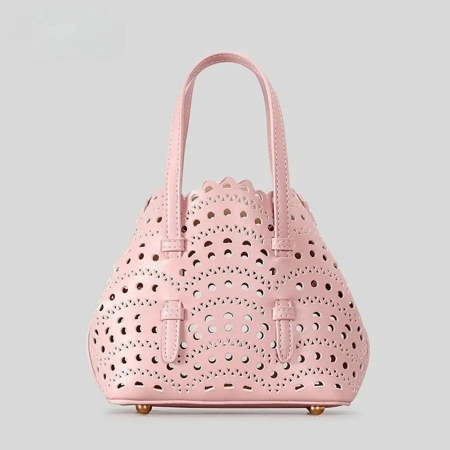 Hollow carved PU messenger bag with three shoulder straps in horizontal square shape