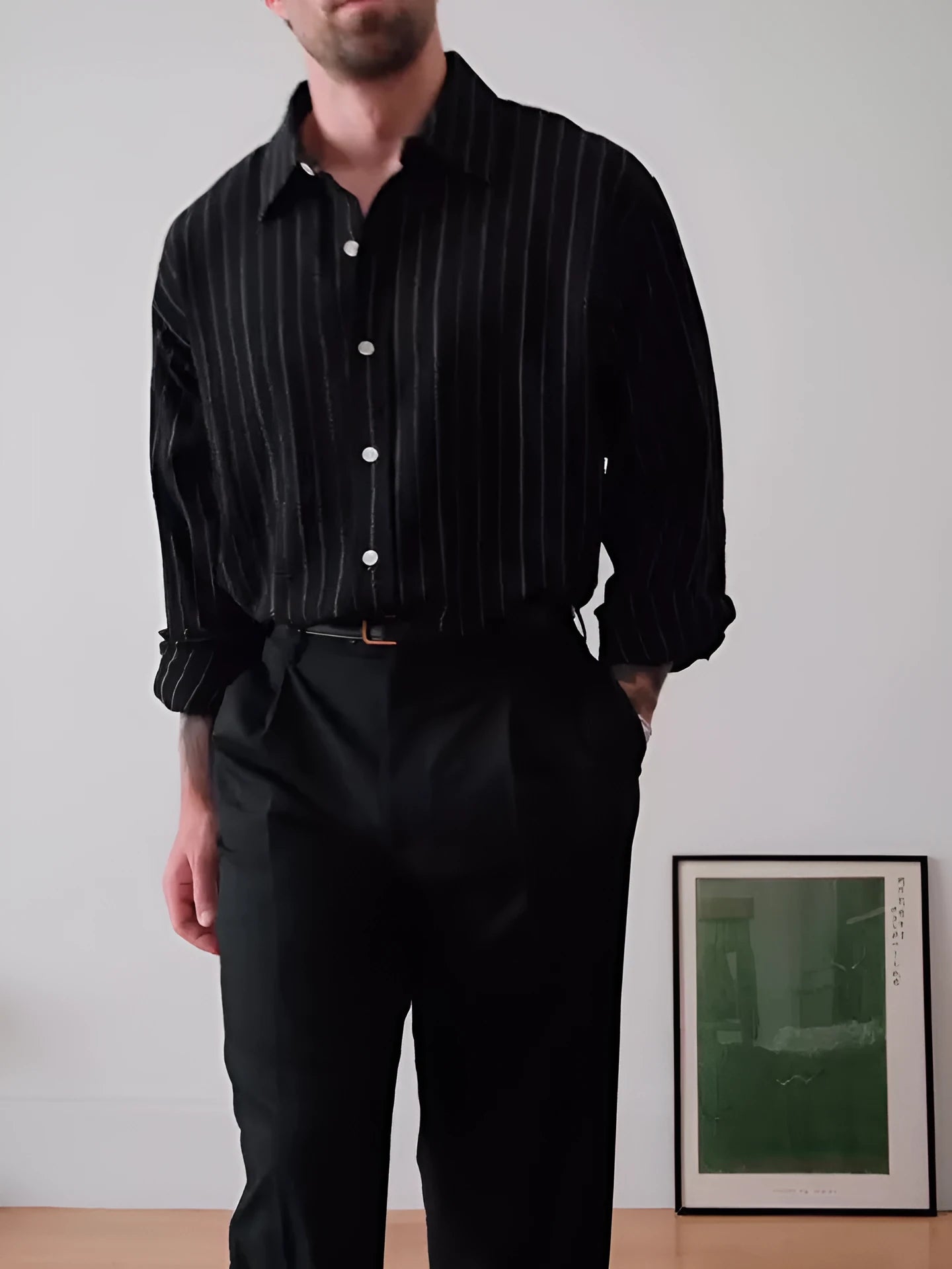 Black pinstripe button-down long-sleeve shirt laid flat, showing regular fit and striped pattern.