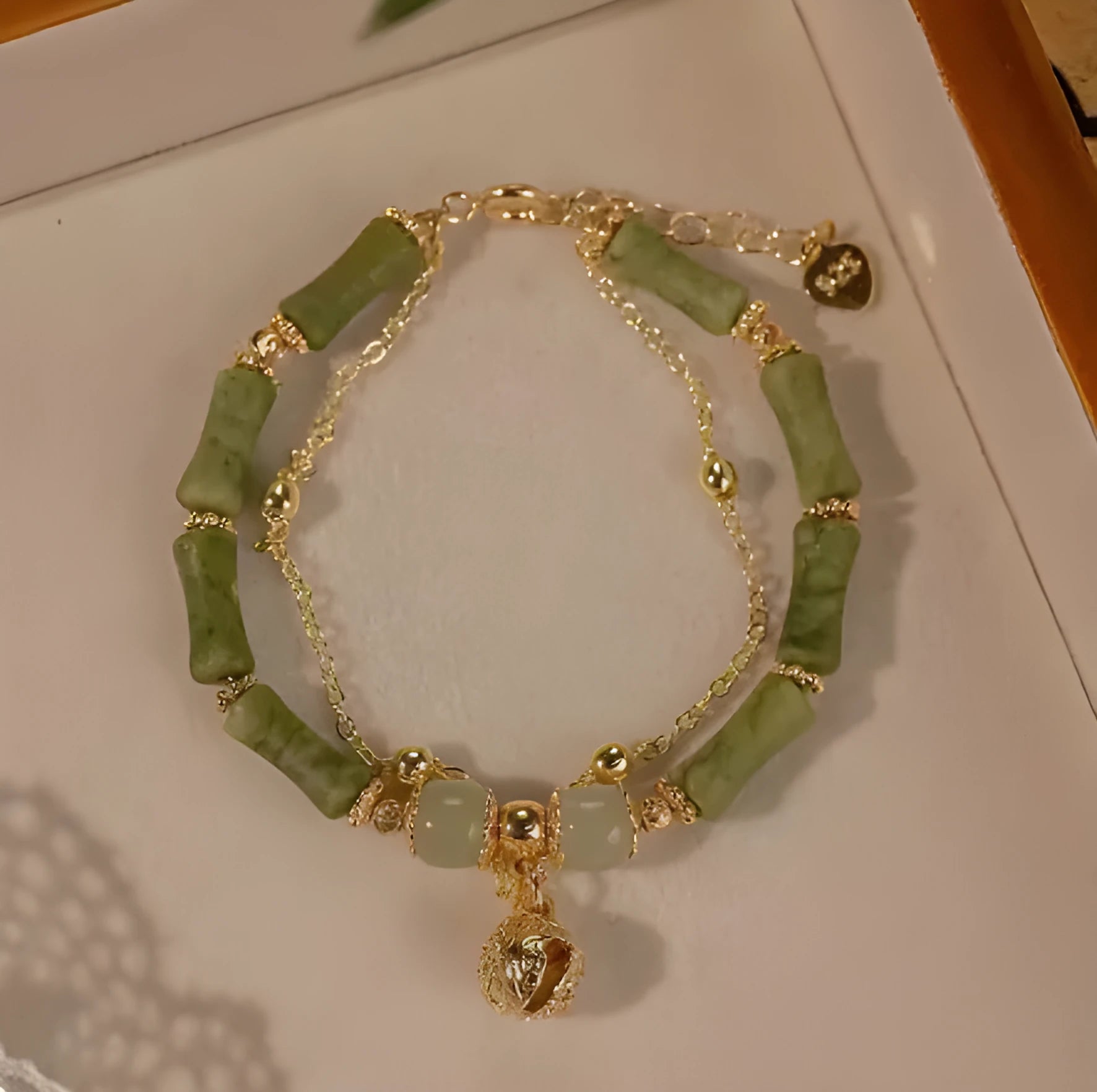 Women's Hetian jade bamboo bracelet on wrist, adjustable 15+3 cm, natural stone geometric design