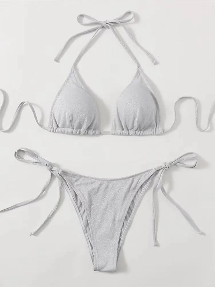 Women's bandage bikini swimsuit set in polyester available in six colours with detailed sizing chart