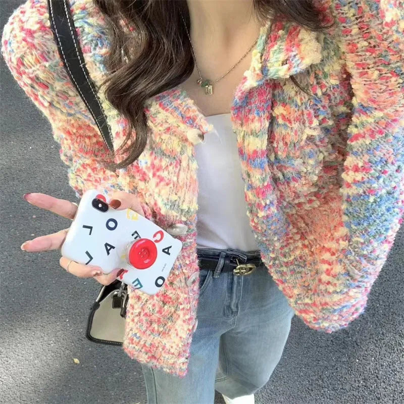 Retro slim fit pink knitted cardigan with regular sleeves on a hanger