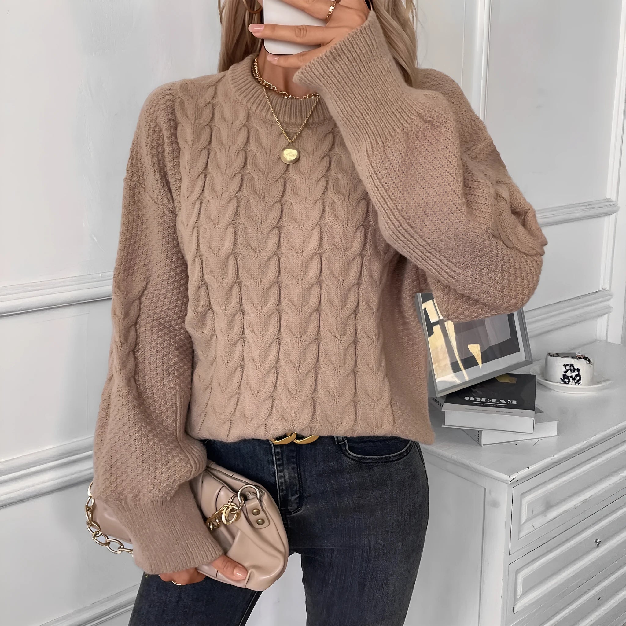 Women's loose fit round neck casual sweater in khaki colour with twist thread design detail.