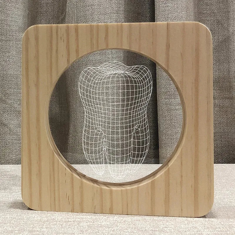 Tooth shaped wood coloured plastic USB night lamp on a surface