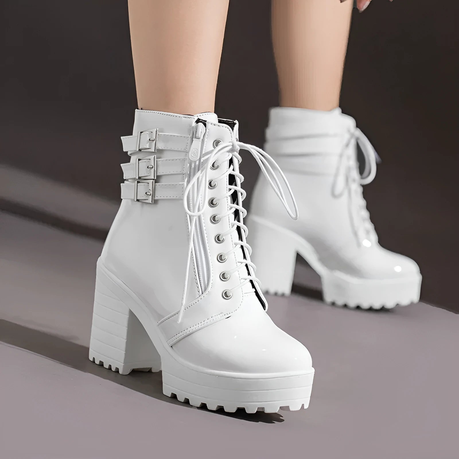 Women's black thick heel ankle boots with lace-up front and round toe on waterproof platform sole