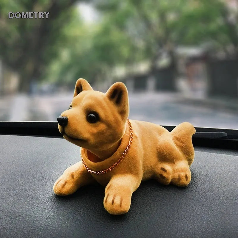 Resin head-shaking dog car decoration in Labrador colour, modern style, on a car dashboard