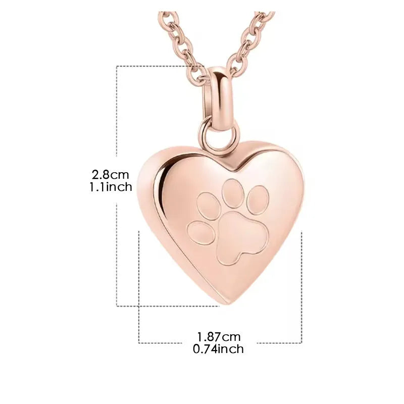 Openable heart-shaped cinerary casket necklace with paw print, made from polished titanium steel.