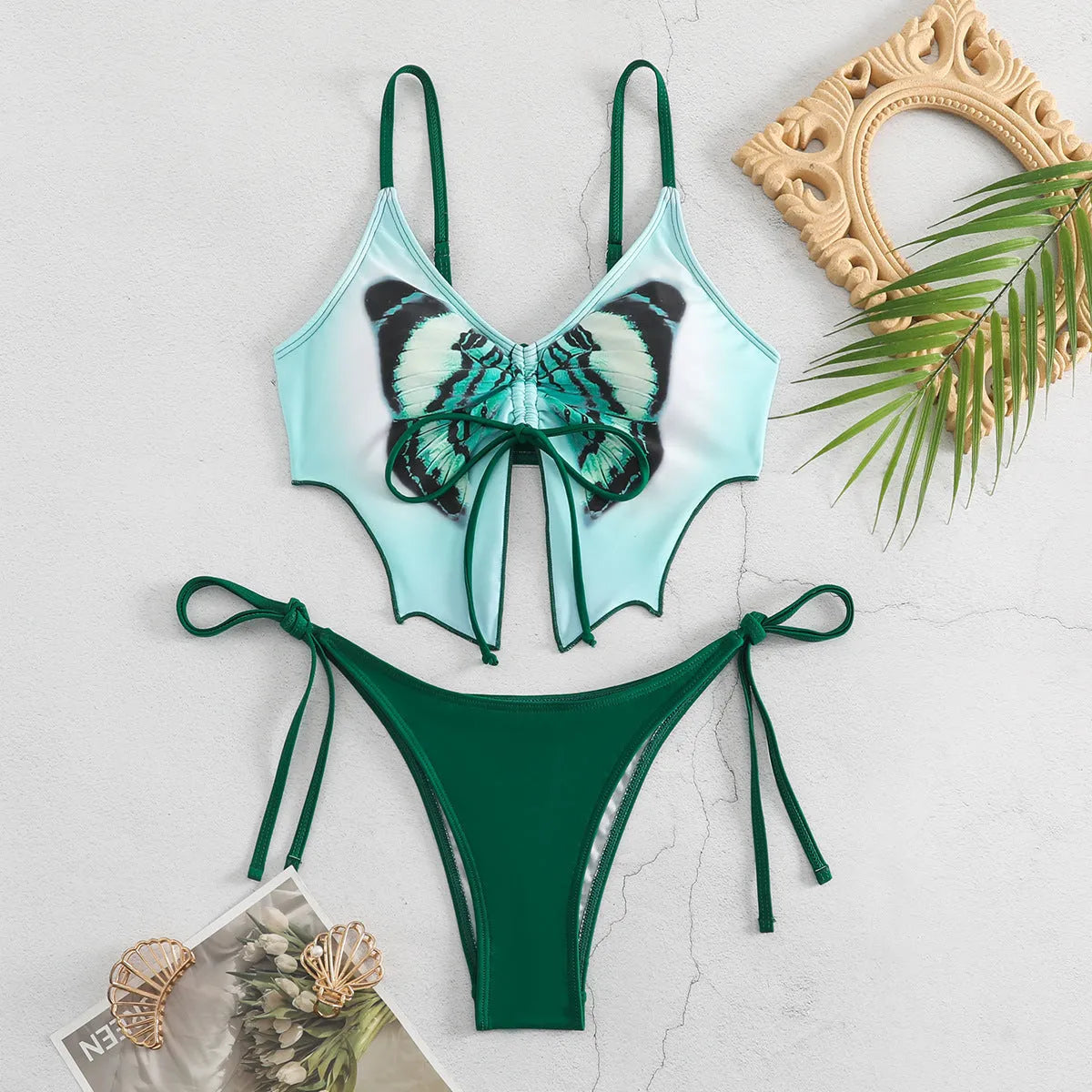 Women's purple bow ins style split bikini set with sleeveless top and briefs for swimming.