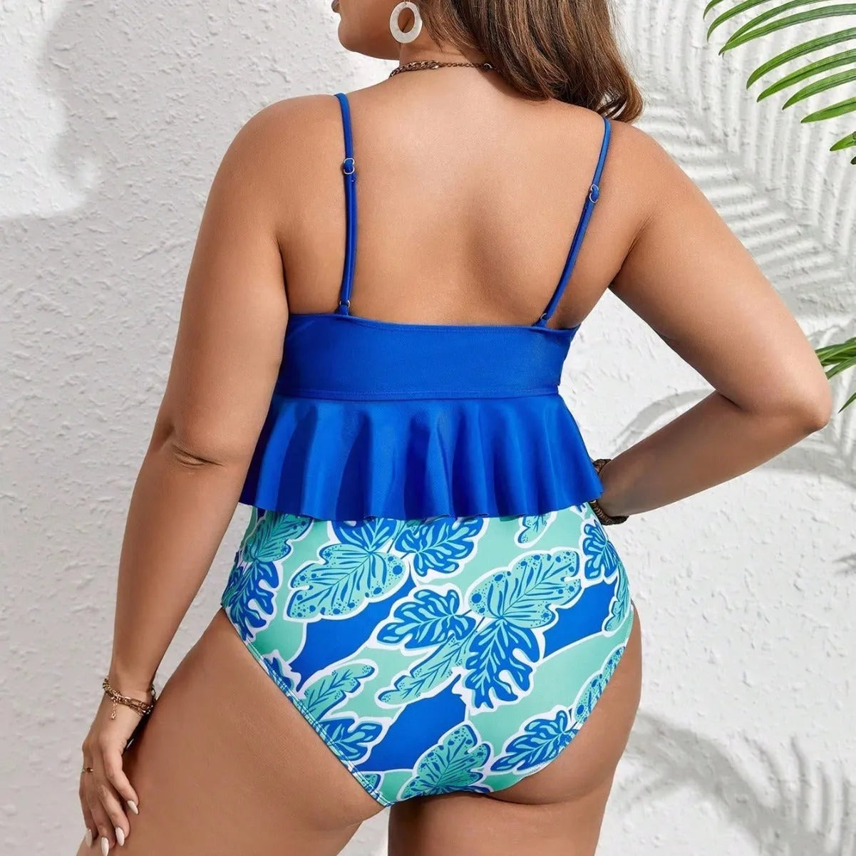 Blue polyester two-piece swimsuit set showing top and briefs style shorts