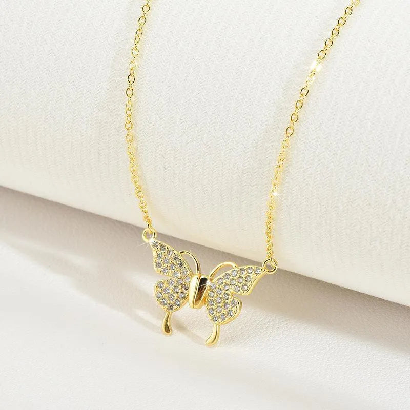 Gold titanium steel clavicle necklace with magnetic butterfly pendant on twisted chain