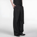 Black straight-leg trousers with a single pleat front and an adjustable waistband, laid flat.