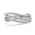 Silver ring with round zircon inlay, platinum colour, sits on a flat surface, side view