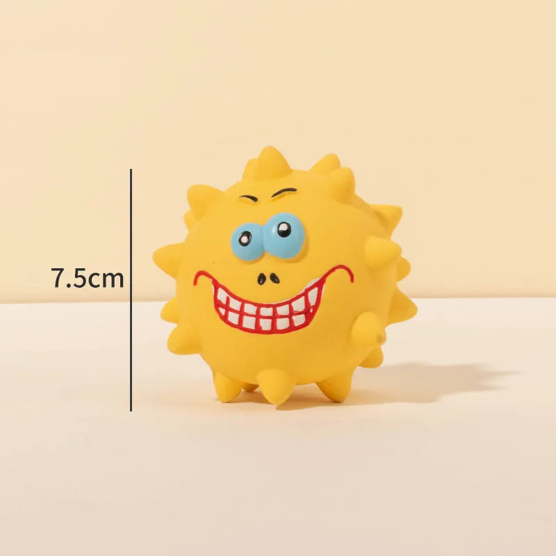 Set of four colourful latex squeaky dog balls with cute faces on bumpy textured surfaces