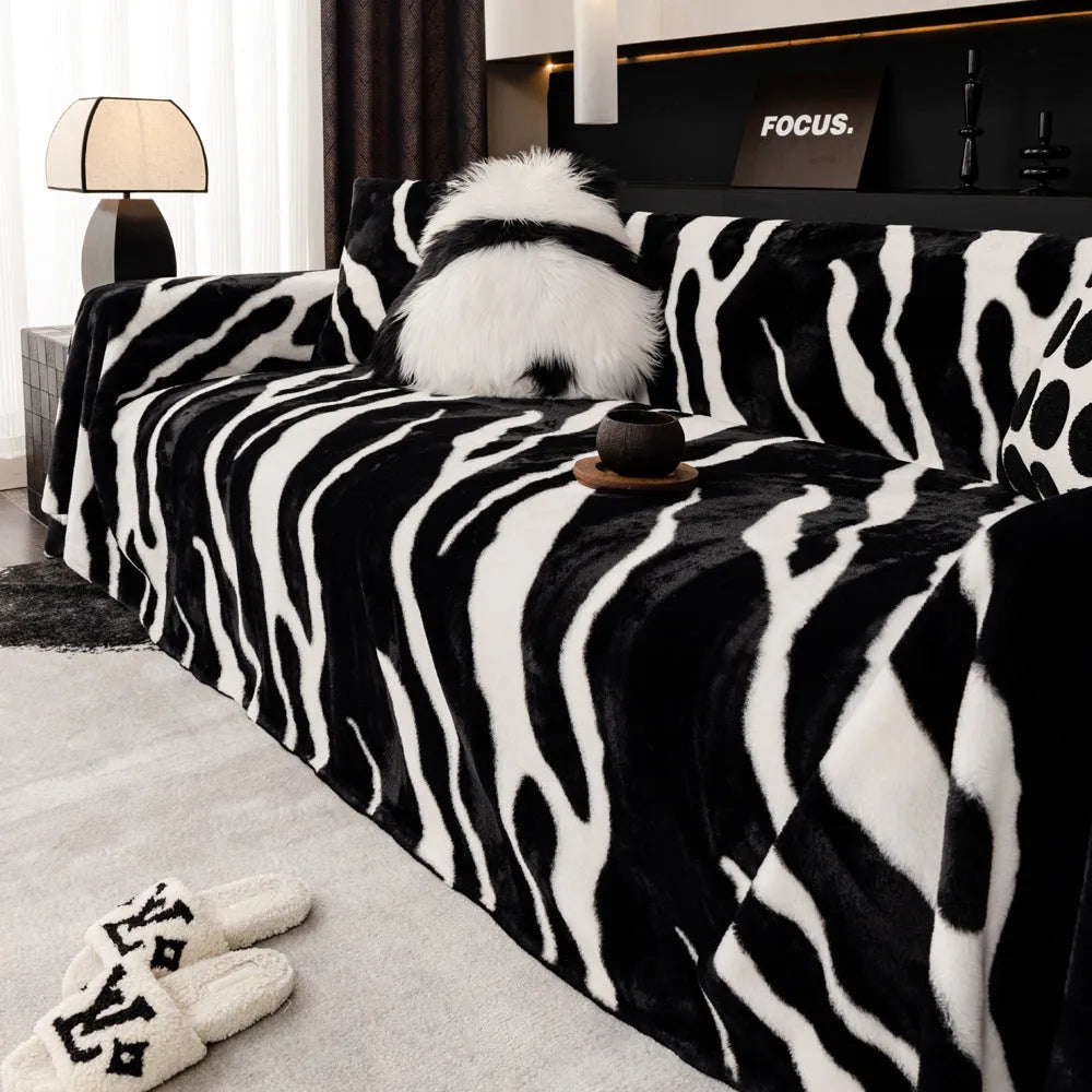 Zebra pattern flannel sofa slipcover in caramel colour showing non-slip underside and matching pillowcase