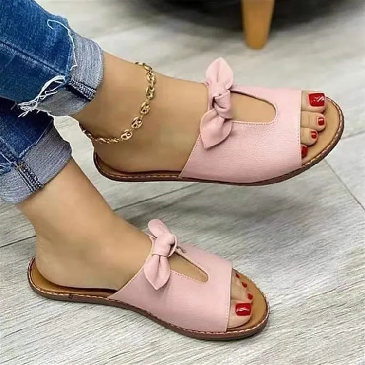 Ladies fish mouth sandals with a bow on the artificial PU upper, shown in black, pink, or gold.