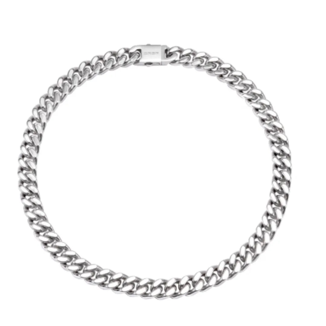 Polished titanium steel Cuban link choker chain necklace in 12mm width on black background