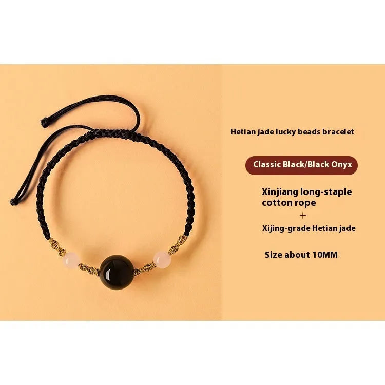Hand-woven red rope bracelet with Hetian jade lucky beads and Chinese motif carvings
