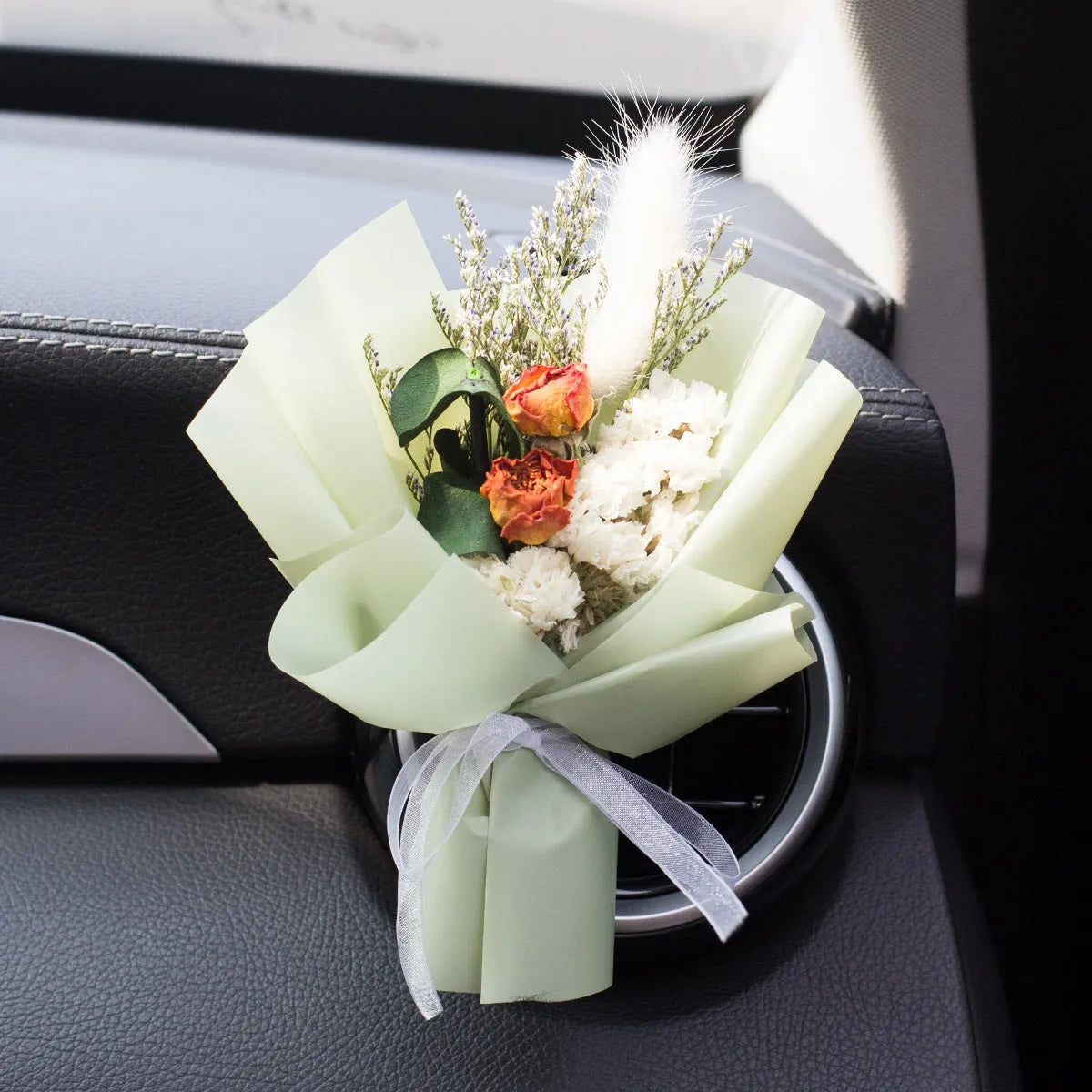 Handmade dried flower car air freshener ornament with scented slice on car vent