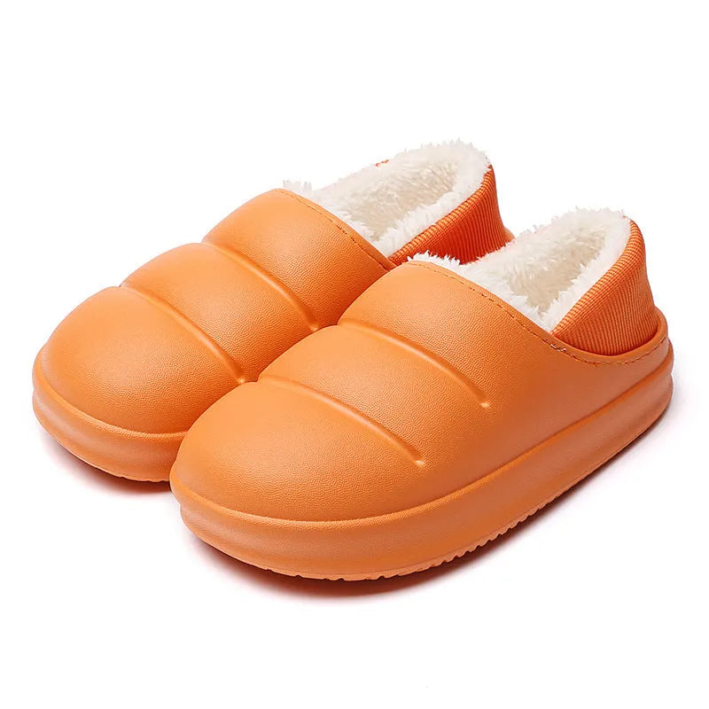 Women's waterproof EVA garden slippers in green, showing overshoe design with plush lining and non-slip sole.