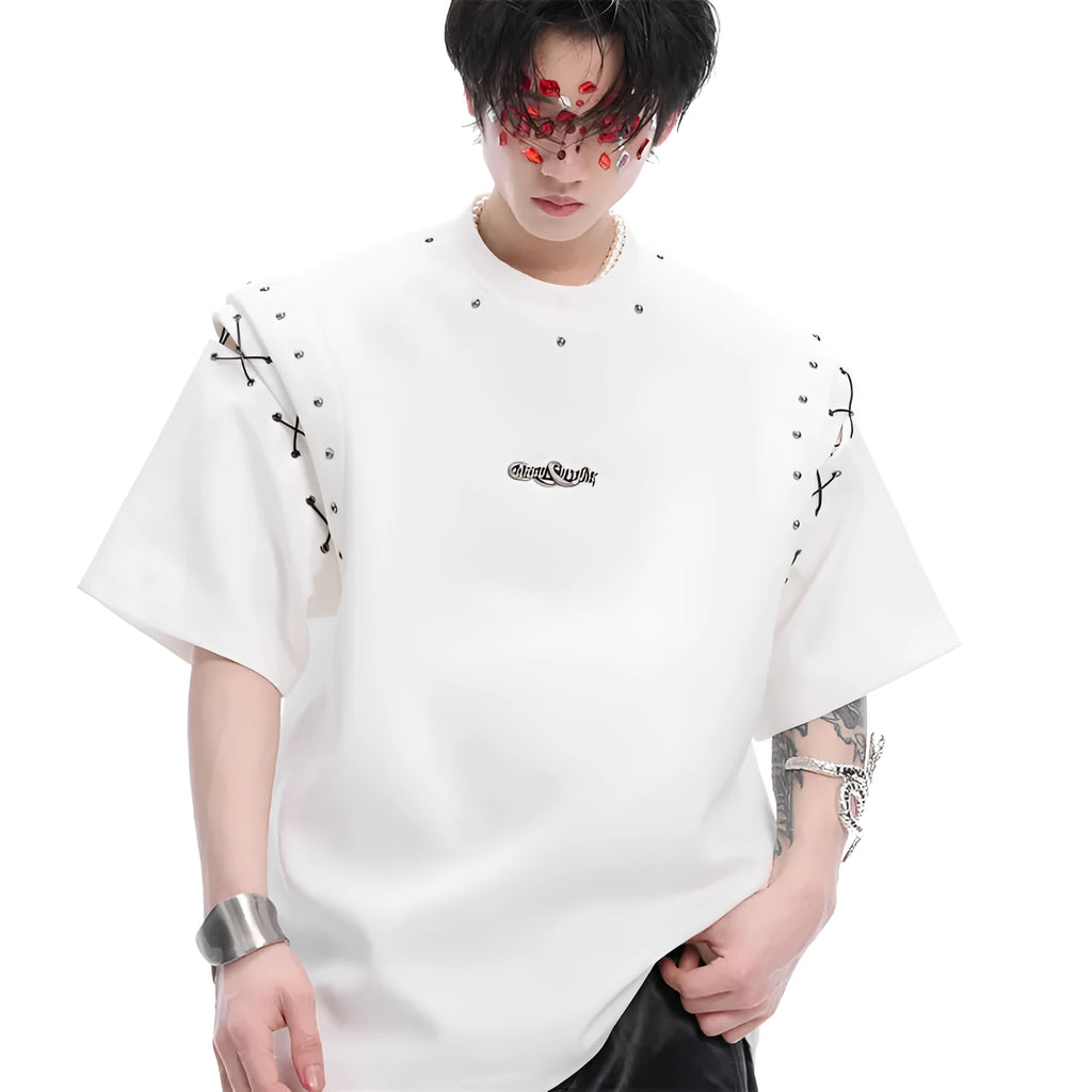 Short sleeve black top with a white lace-up cutout detail on the front, deconstruction style.