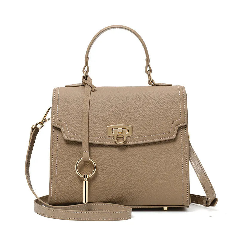 Elephant grey genuine leather vintage lock handbag with crossbody strap and square vertical shape