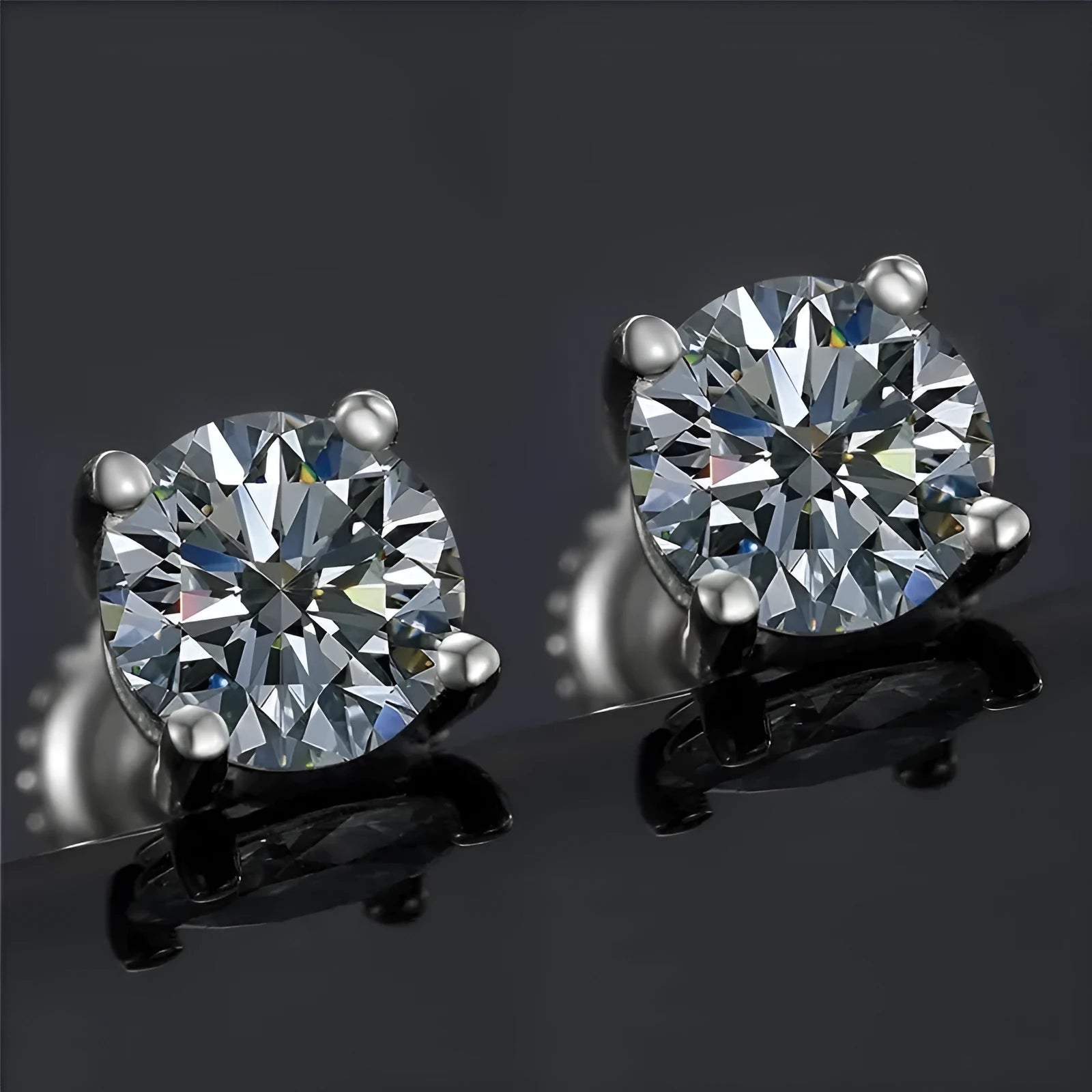 Silver geometric screw-back stud earrings with moissanite stones in four-claw setting