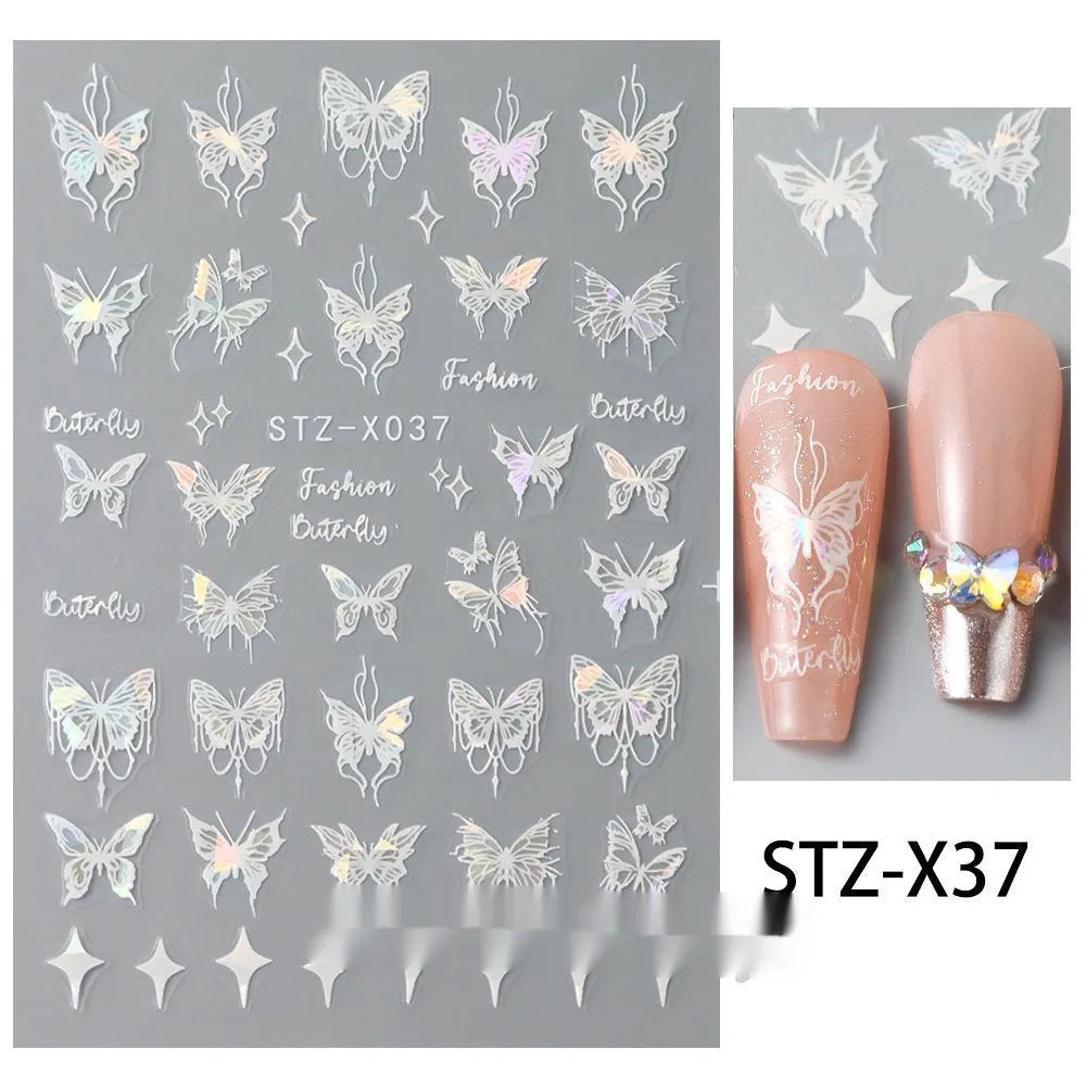 Sheet of black and silver strip nail art stickers with cartoon and love heart designs