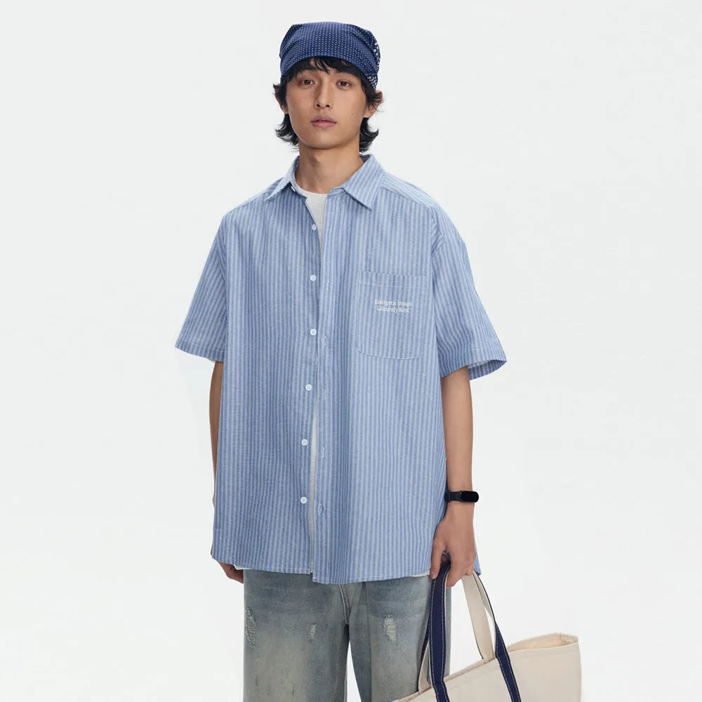 Blue striped short-sleeved overall shirt with cardigan opening and cotton blend fabric