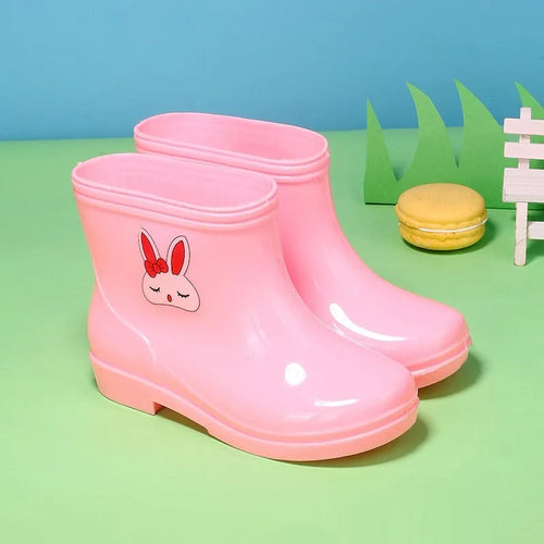 Children's non-slip rain boots in solid colour, plastic upper, mid-calf height, sizes 22-31 yards