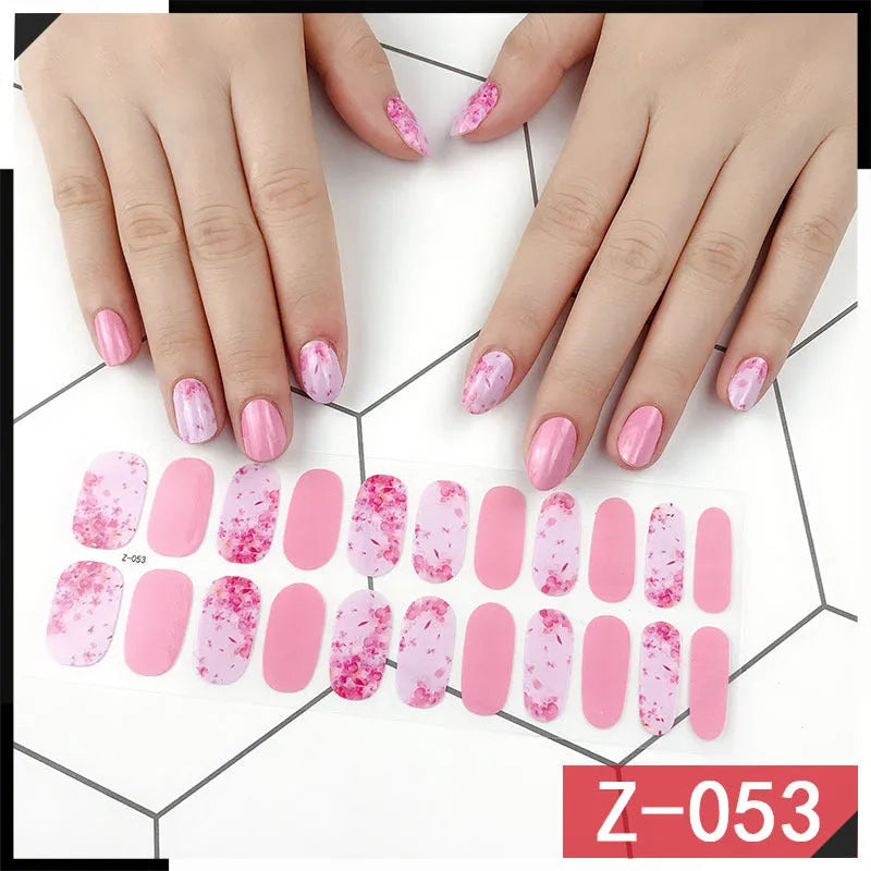 Korean Exquisite Nail Stickers pack showing colourful cartoon, floral, and embellished designs with included nail file.