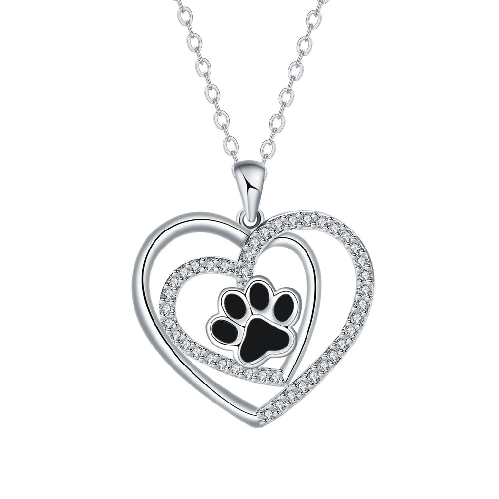 Copper dog paw print necklace with heart motif on cross chain for women