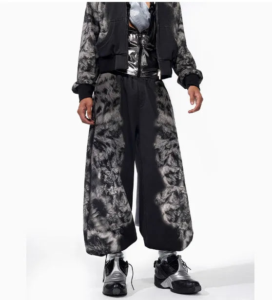Streetwear set showing trousers, hoodie, and shorts in printed polyester fabric with loose fit design
