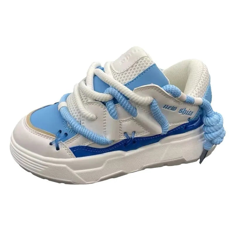 Women's grey retro clunky sneakers with thick rubber sole and lace-up front, showing 6-8cm heel height