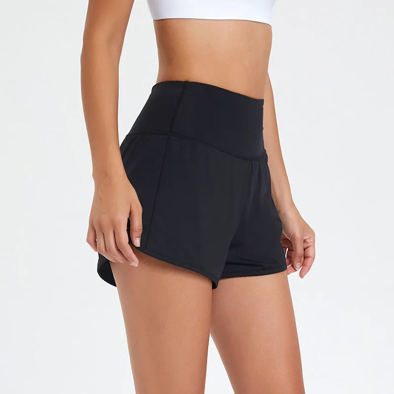Nylon women's fitness shorts in black, water blue, or white with high waist design