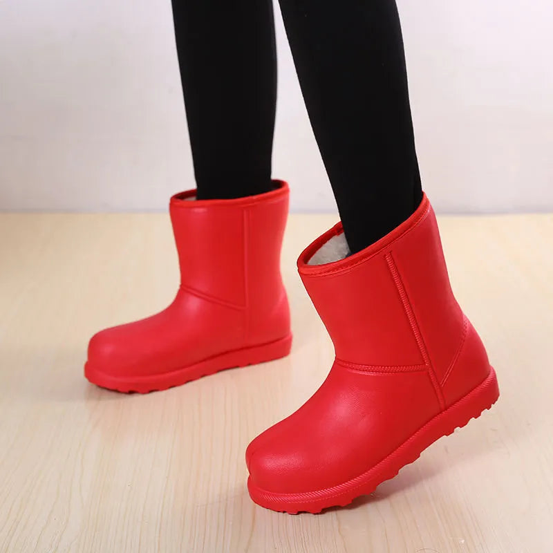 Women's mid-calf EVA waterproof snow boots with velvet lining, platform heel, round toe, in black