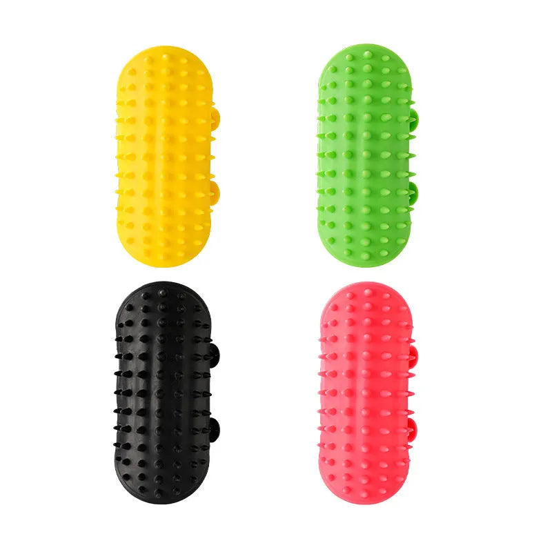 Silicone pet massage comb with adjustable strap attached to table leg