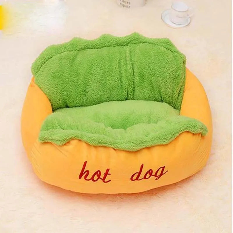 Grey hot dog style pet bed with high sides, a removable centre mat, and an anti-slip fabric base.