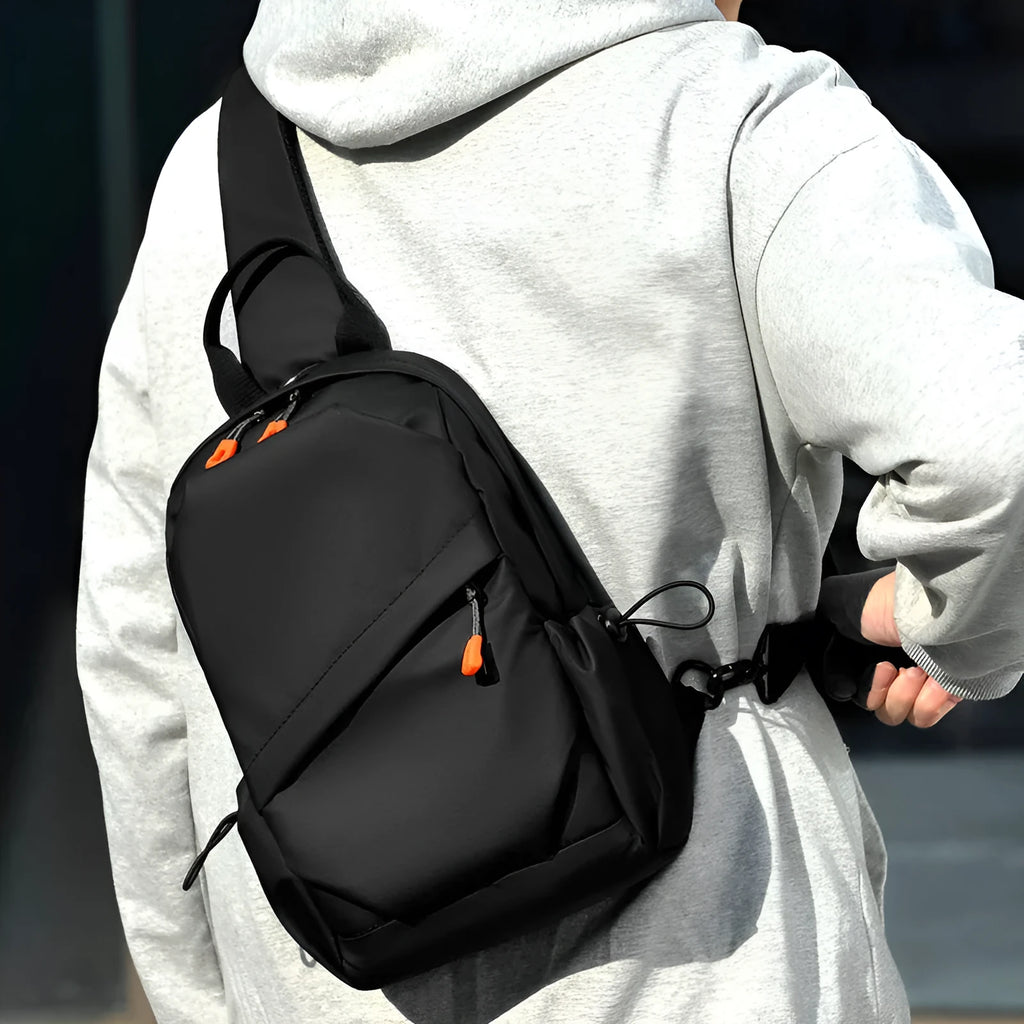 Men's black waterproof polyester crossbody bag with single shoulder strap and simple casual design