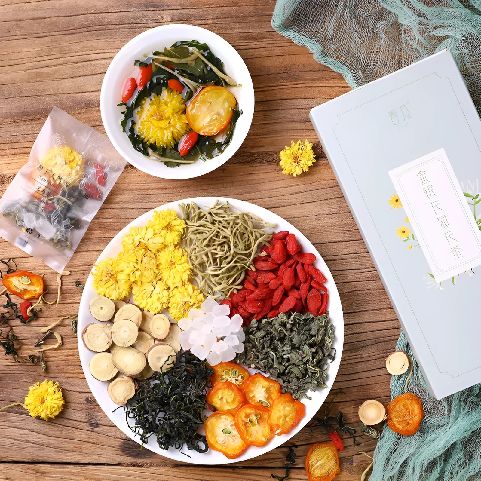 Box of honeysuckle chrysanthemum herbal tea bags with 150g net weight label.