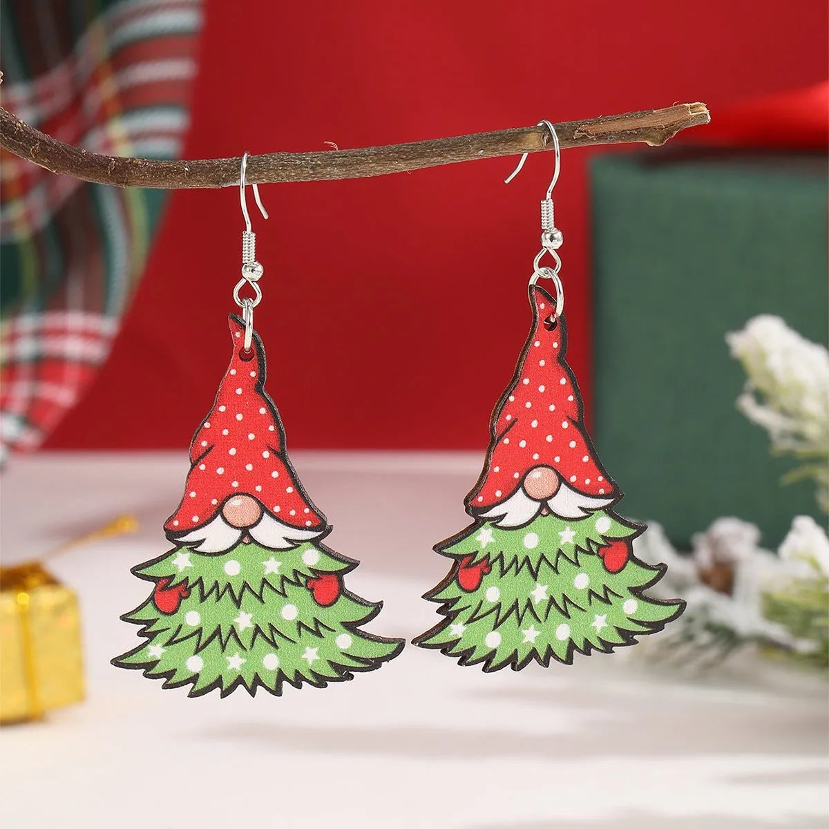 Wooden Christmas earrings with printed tree and snowman designs