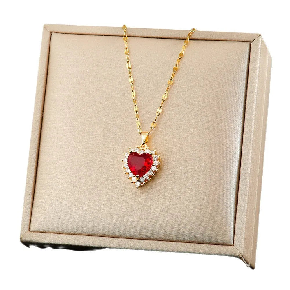 Gold-red titanium steel jewellery set with heart flower pendant necklace, stud earrings, and ring.