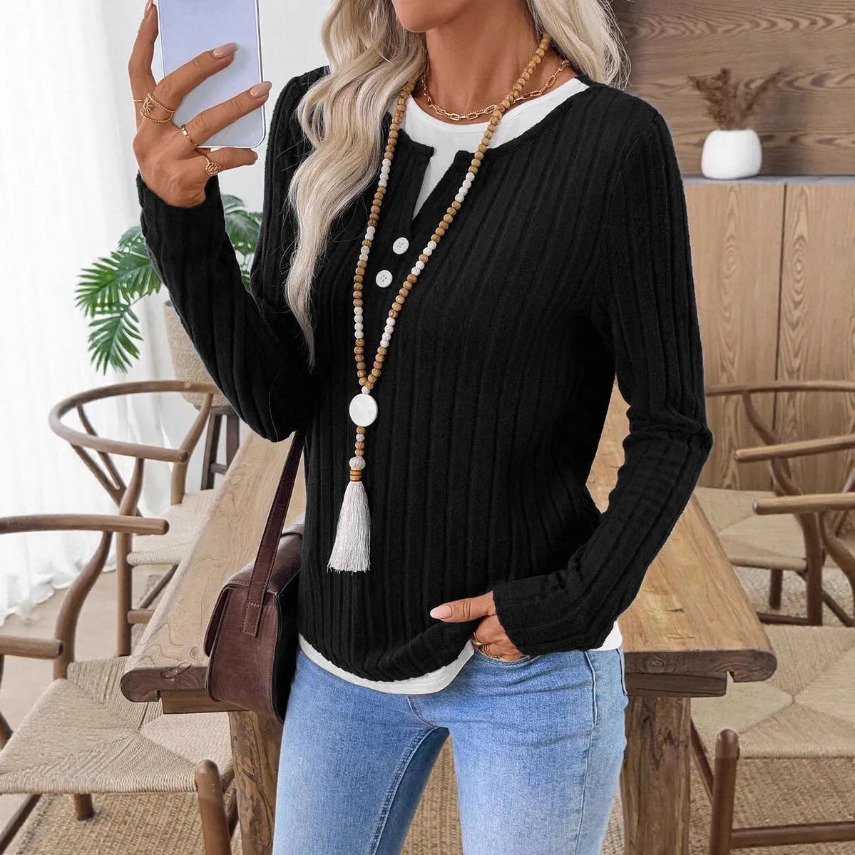 Women's fake two-piece pullover sweater with round neck and button detail in concave stripe polyester
