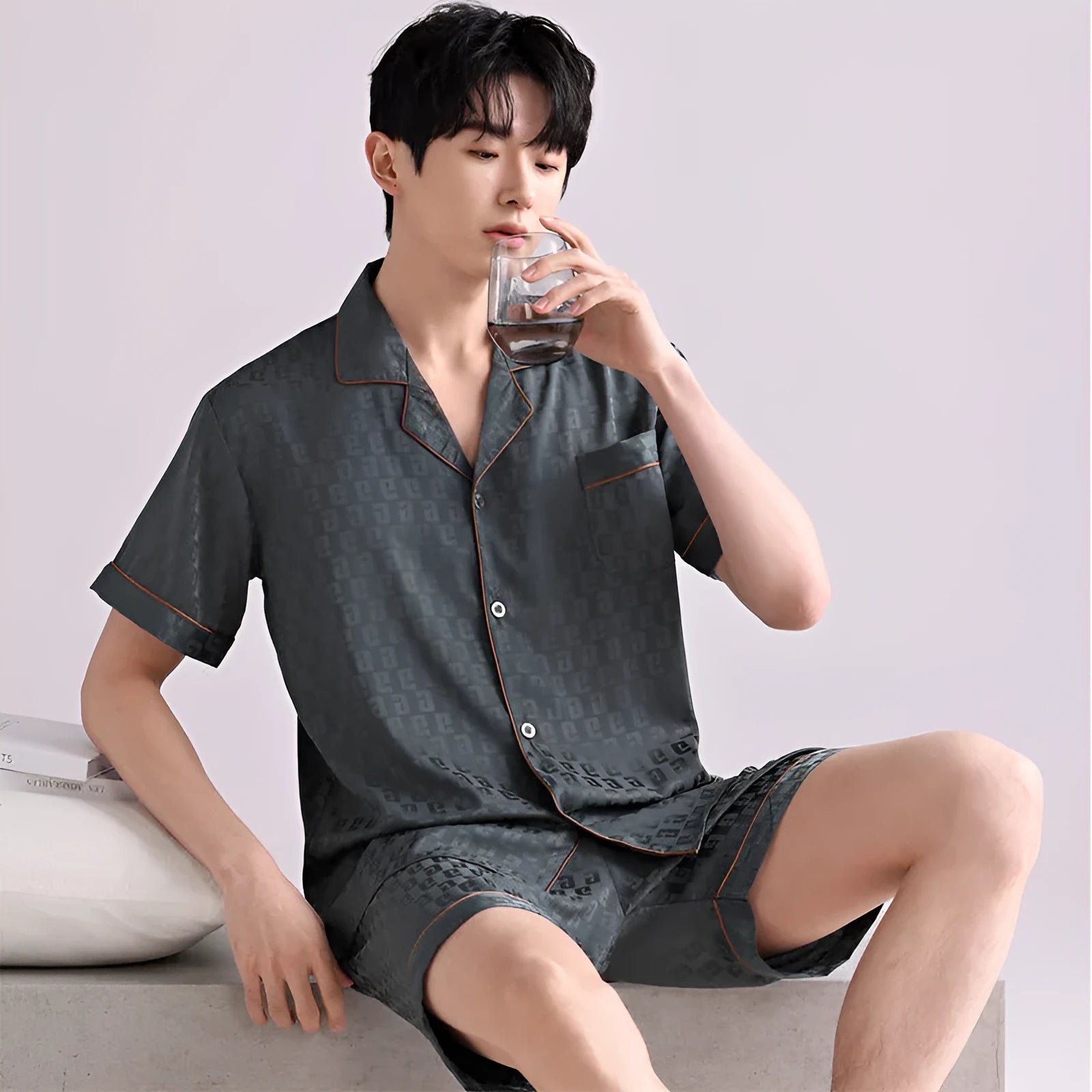 Men's ice silk pyjamas set showing cardigan top and shorts in satin jacquard pattern