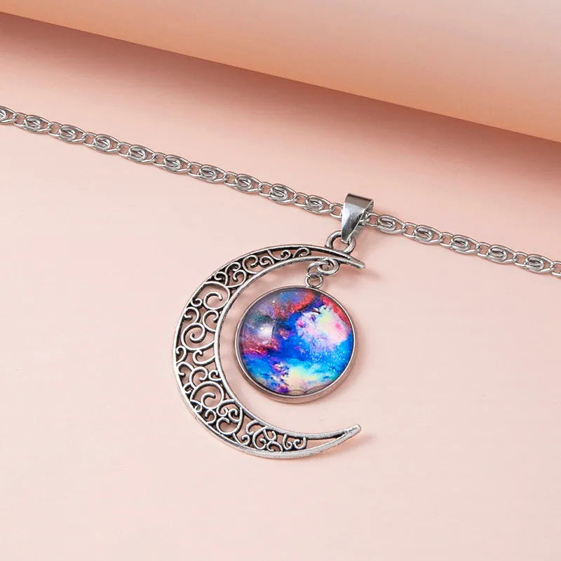 Silver hollow moon pendant necklace with glass star insert on Figaro chain for women