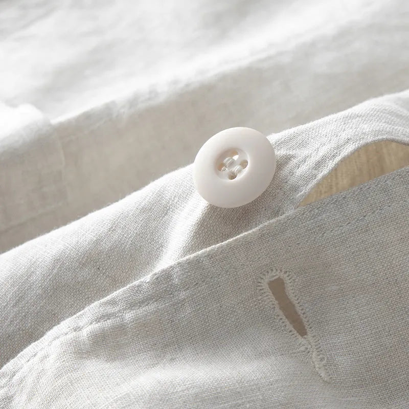 Men's loose fit linen casual suit jacket in solid colour, shown in available colours: white, black, natural linen, sky blue, navy blue.