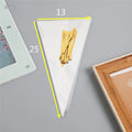 Transparent triangular plastic bag with a red wire tie closure.