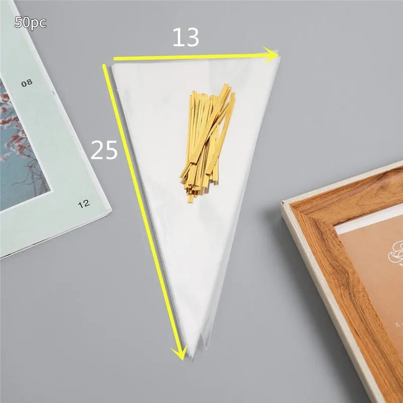 Transparent triangular plastic bag with a red wire tie closure.